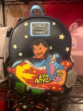 Loungefly Disney Lilo & Stitch Space Adventure Mini Backpack. Glows in the Dark